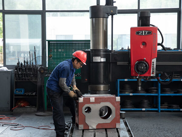 A worker operating equipment to repair KAIBO industrial gear reducers. This image represents the repair service in KAIBO’s after - sales system, showcasing technical expertise and commitment to product reliable operation.